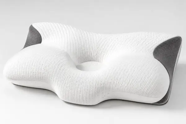 Sutera Pillow Review (2026): My Honest Experience After 45 Nights 5 Close-up of Sutera pillow showing neck nook contour and arm grooves