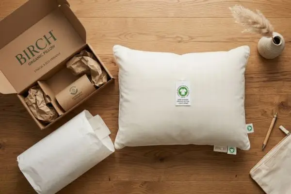 Birch pillow unboxing with eco-friendly packaging and GOTS organic certification tag
