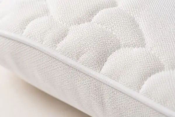 Breathable cotton cover detail of Eli & Elm Cotton Pillow

