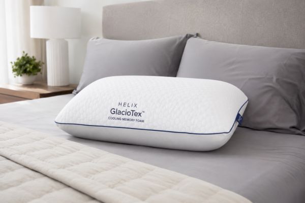 Helix GlacioTex Cooling Memory Foam Pillow displayed on modern bed

