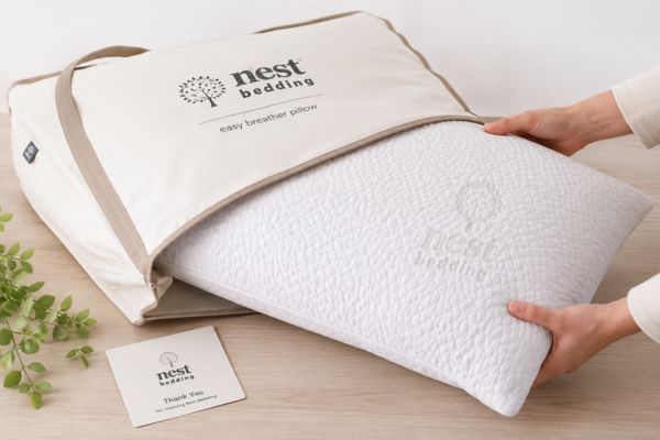 Nest Bedding Easy Breather pillow unboxing showing premium canvas bag packaging