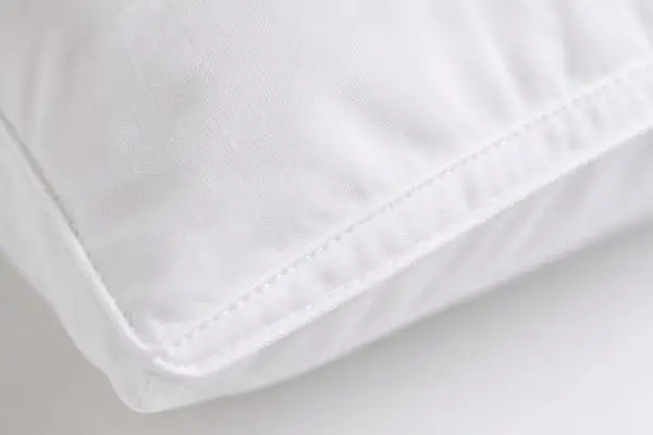 Cotton percale cover detail of Silk & Snow pillow

