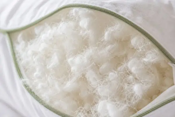 Close-up of plant-based down alternative fill inside Sweet Zzz pillow

