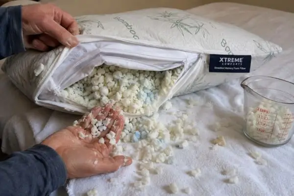 My 45-Night Reality Check: Xtreme Comforts Shredded Memory Foam Pillow – The Truth About Adjustability 8 Irregular shredded memory foam fill pieces from Xtreme Comforts pillow showing varying sizes